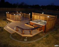 A nice wood deck looks great at night with post cap lights.